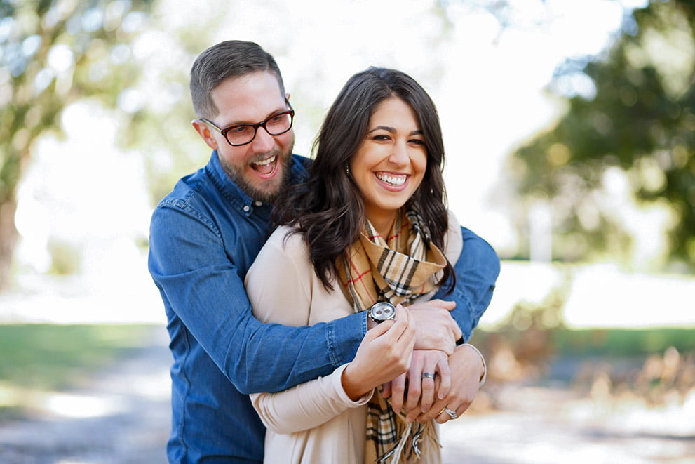 Happy couple embracing in a park